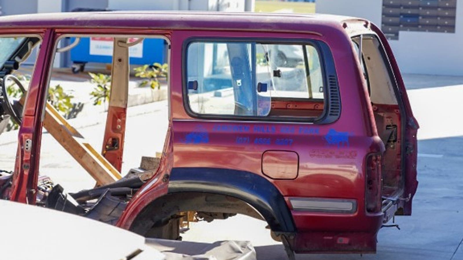 The donor LandCruiser 80 Series body alongside the Chinook front clip